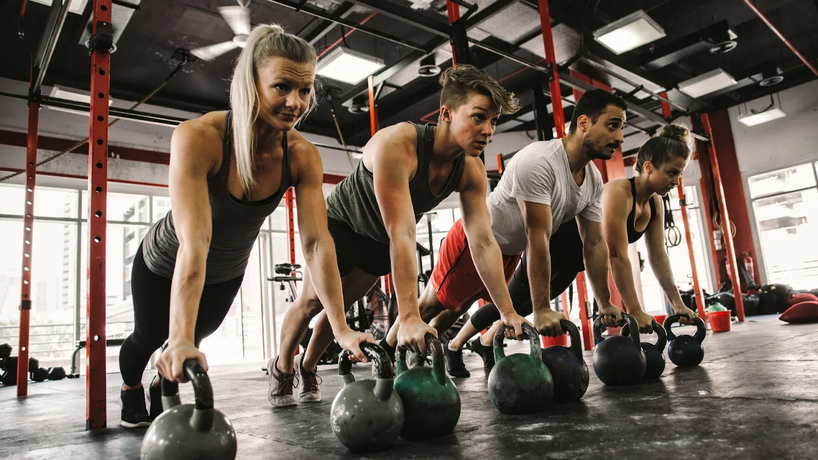 group of people training in the gym